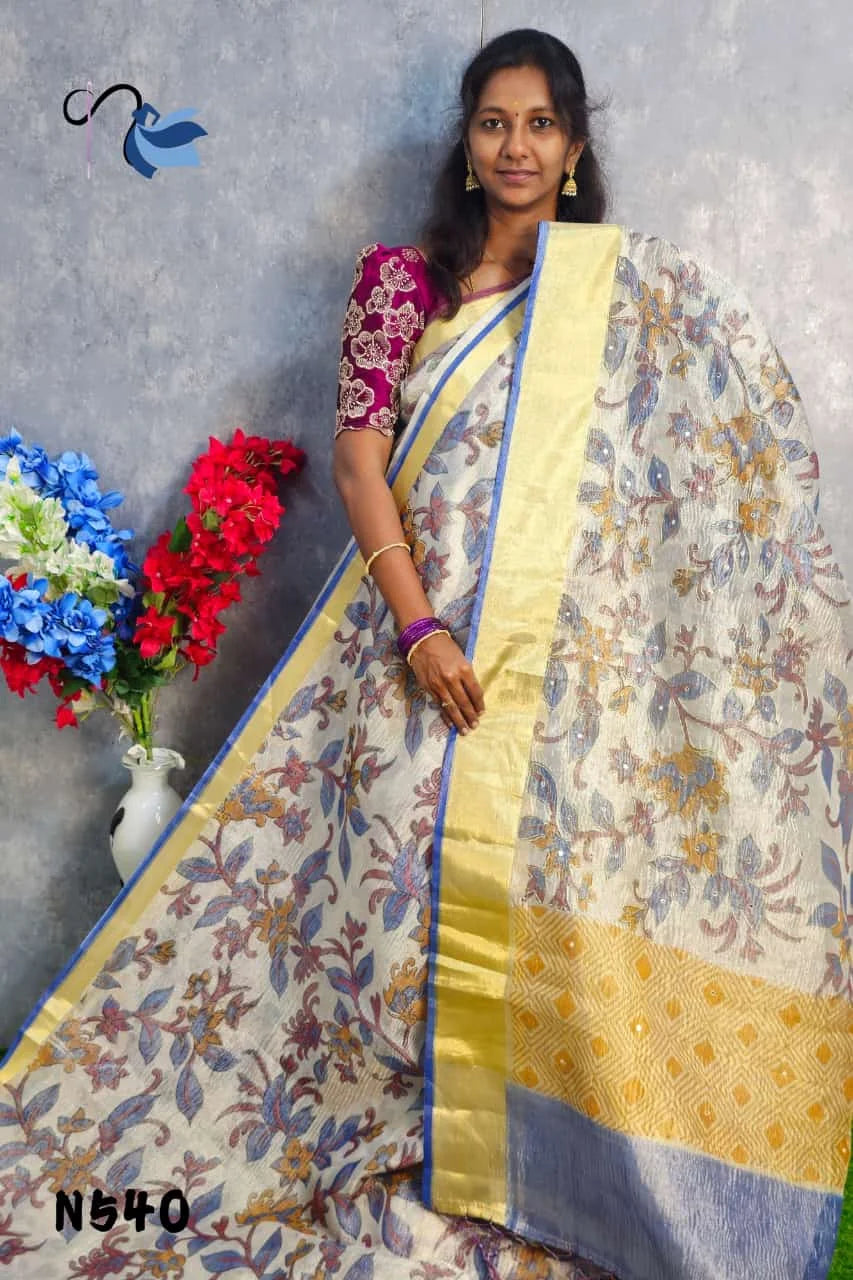 Blooming in beauty with this crush tissue silk saree
