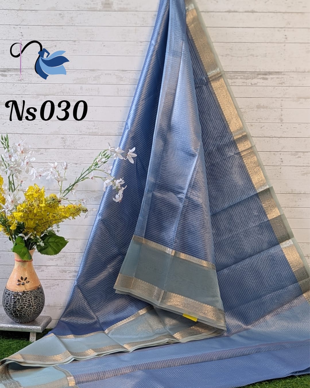 Exquisite tissue silk saree featuring delicate zari stripes