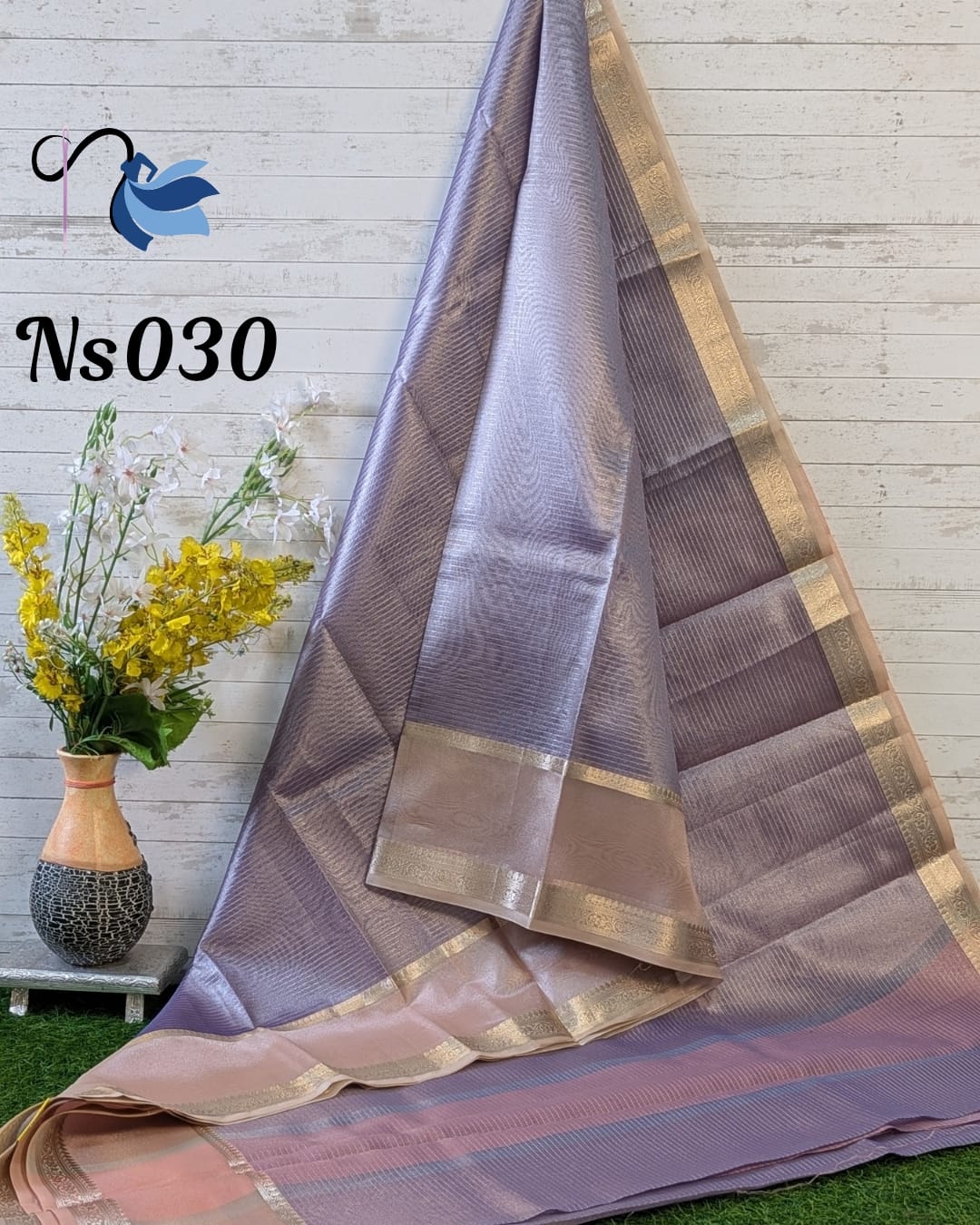 Exquisite tissue silk saree featuring delicate zari stripes