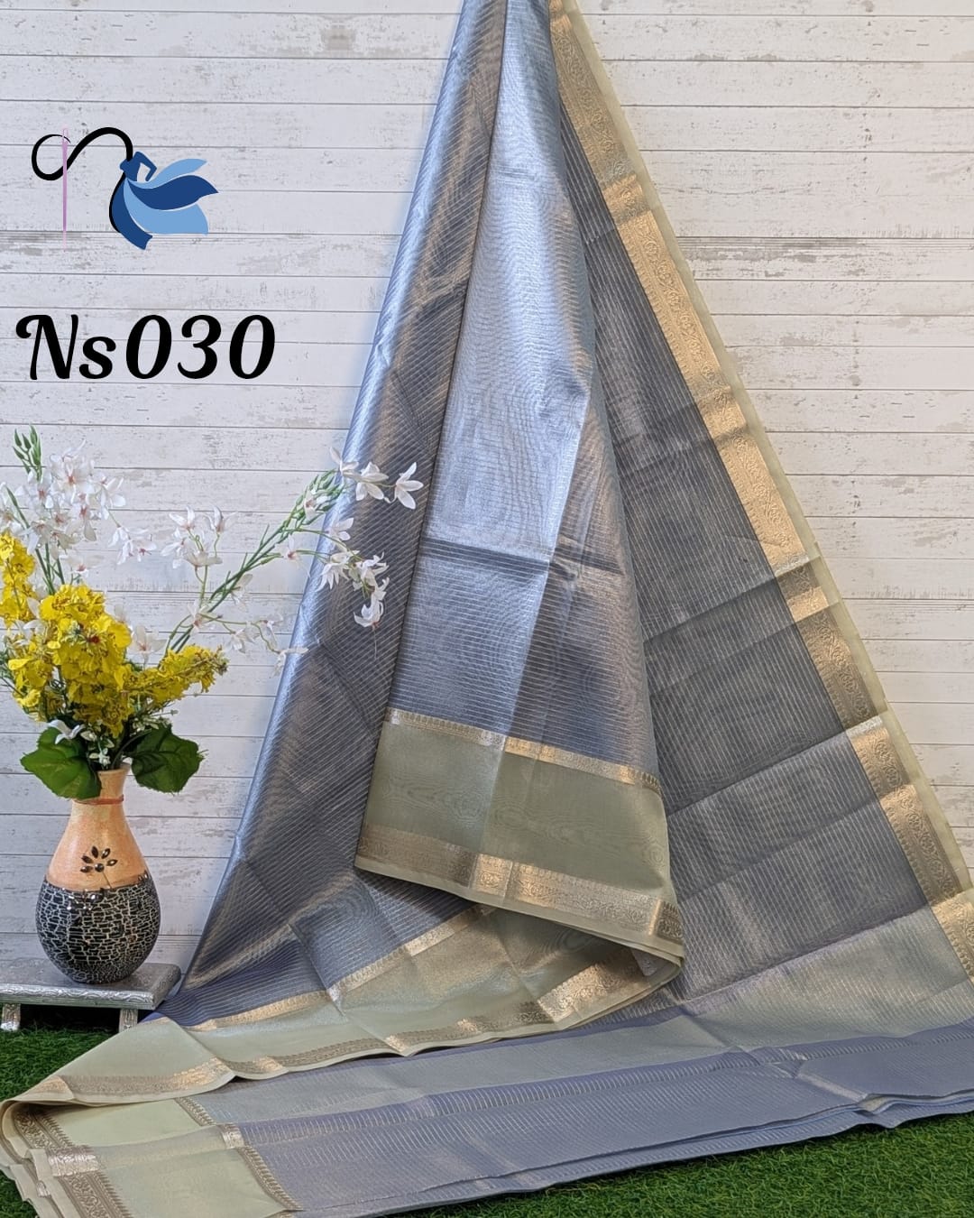 Exquisite tissue silk saree featuring delicate zari stripes